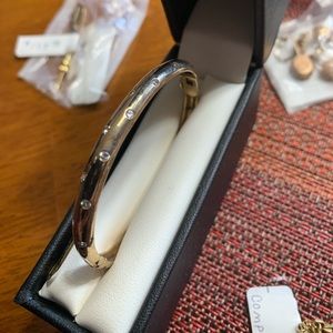 Gold and diamond bangle